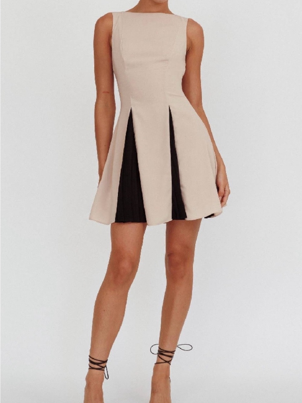 Sleeveless Cream Mini Dress with Black Panel Accents